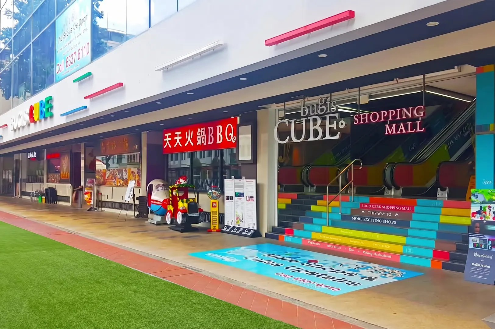 Bugis Cube shopping mall entrance and storefronts in Bugis Singapore.