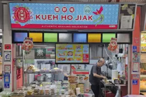 Kueh Ho Jiak food stall selling authentic Nanyang delicacies at a hawker center.