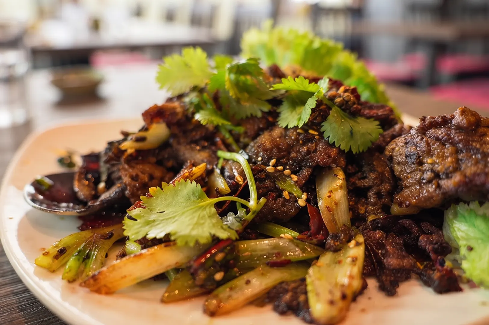 Vegetarian Mala Crispy Chicken dish served on a plate at New Fut Kai Vegetarian Restaurant in Singapore.