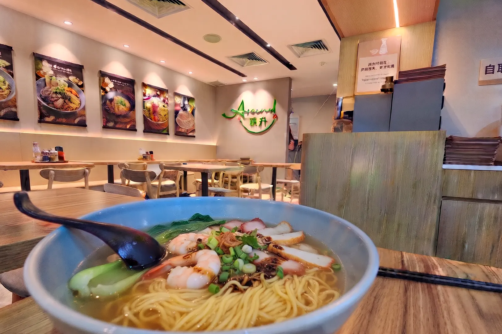 A bowl of vegetarian noodles inside a restaurant in Suntec City Singapore.