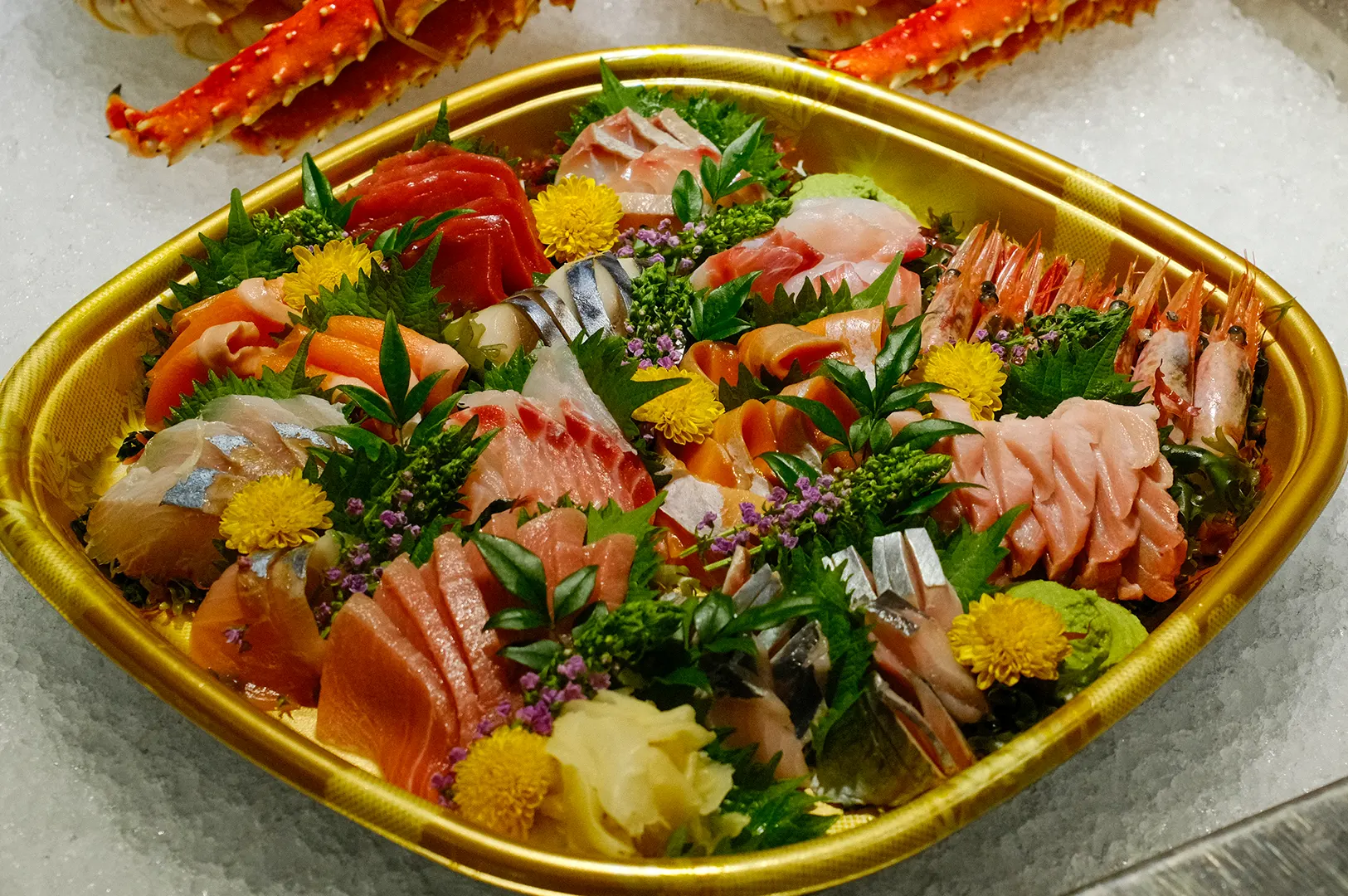 Assorted fresh sashimi platter with salmon.