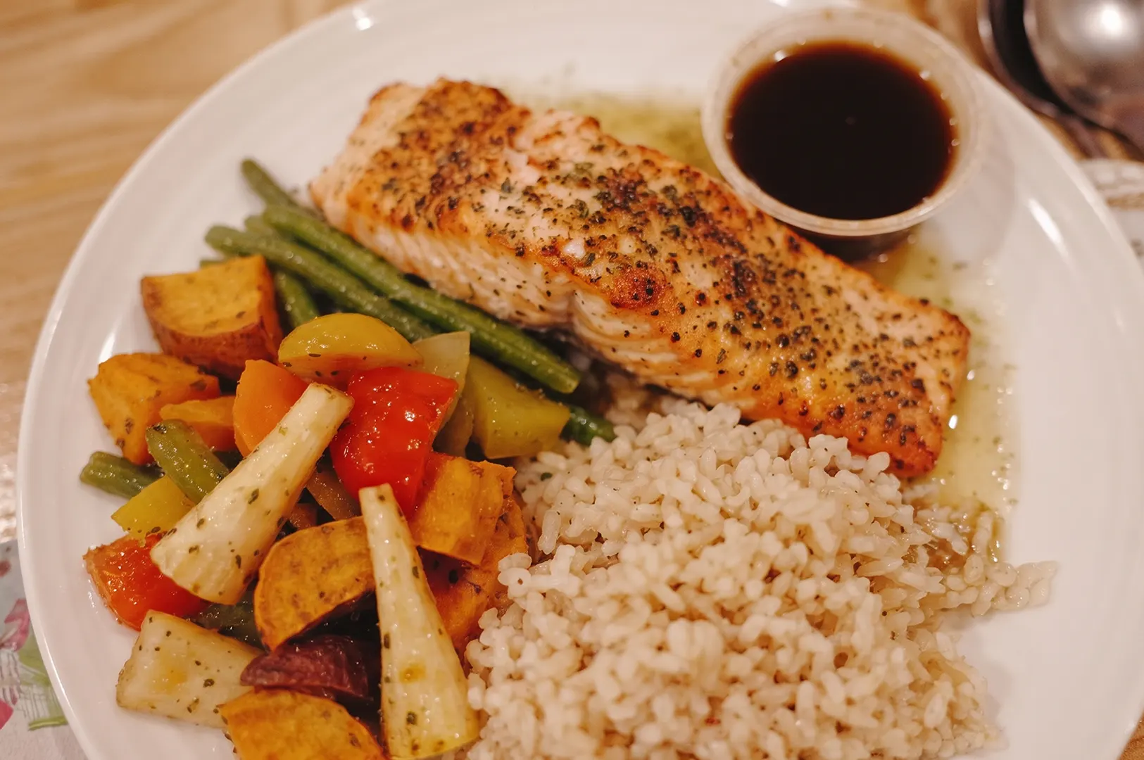 AMGD healthy meal plan Under the See featuring baked salmon, brown rice, green beans, and roasted vegetables.