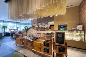 Interior view of Real Food cafe at Orchard Central showcasing organic products display and cozy dining atmosphere.