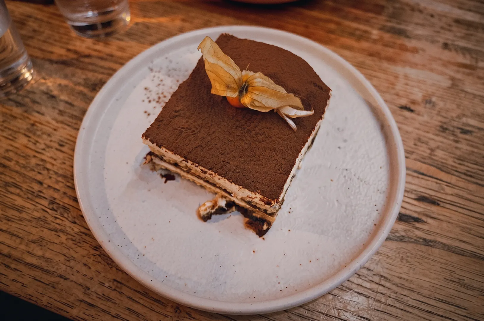 Tipo's signature tiramisu served on a white plate.